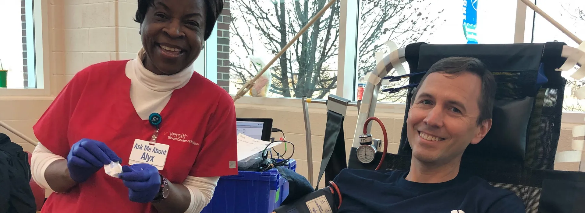 Togetherhood committee member donating blood